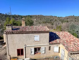 Vente Maison plain-pied 101m2 avec vue dégagée et garage