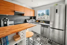 Vente Puteaux Bellini – 3 pièces traversant de 64 m², dernier étage, balcon, parking, cave, vue Tour Eiffel