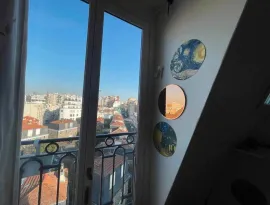 Location Vue sur parc et toits - appartement de charme