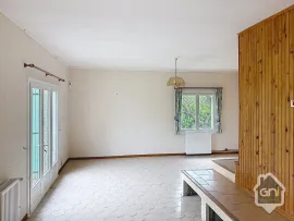 Vente Maison de Type 7 avec jardin.