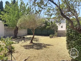 Vente Maison de Type 7 avec jardin.