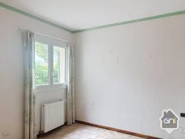 Vente Maison de Type 7 avec jardin.