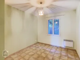 Vente APPARTEMENT EN RDC - AVEC PARKING