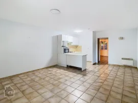 Vente APPARTEMENT EN RDC - AVEC PARKING