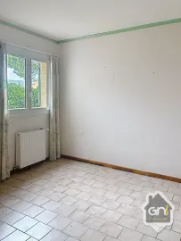 Vente Maison de Type 7 avec jardin.