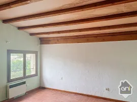 Vente Maison de Type 7 avec jardin.