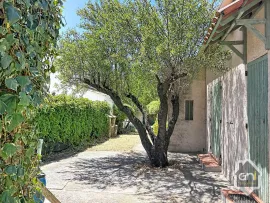 Vente Maison de Type 7 avec jardin.