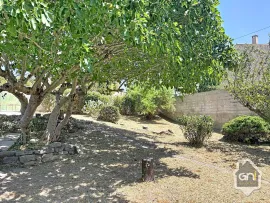 Vente Maison de Type 7 avec jardin.