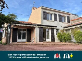 Vente Maison familiale de 150 m² avec double garage, jardin et local commercial de 59 
