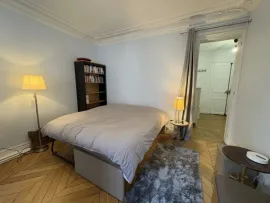 Location Elegant Furnished Apartment with Balcony Facing a Historic Monument