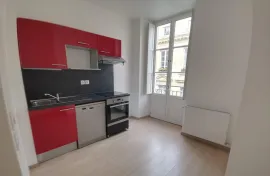 Location TOURNY : Balcon et 2 places de Parking